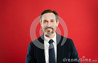 Man handsome mature fashion model wear fashionable suit on red background. Suit imbue sense of confidence of gentlemen Stock Photo