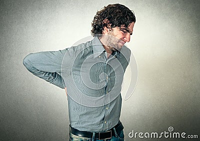 Man has back pain Stock Photo