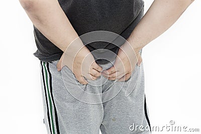 Man has diarrhea holding her Stock Photo