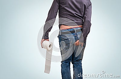 Man has diarrhea. Man holding toilet paper and butt. Stock Photo