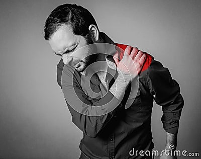 Man has shoulder pain Stock Photo