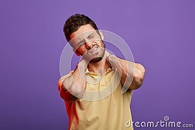 Man has strong pain after working Stock Photo