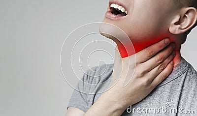 Man has terrible pain in throat because of flu Stock Photo