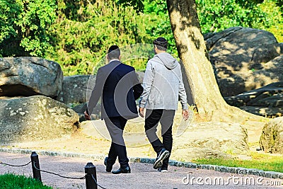 2 man, the Hasidim Jews are walking in the park in Uman, the time of the Jewish New Year, Rosh Hashanah Editorial Stock Photo