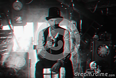 man in a hat and with a cane cosplays a character of a steampunk computer game. Inventor's cyberpunk concept with 3d Stock Photo
