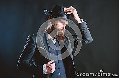 Man with hat. Man well groomed bearded gentleman on dark background. Male fashion and menswear. Retro fashion hat Stock Photo