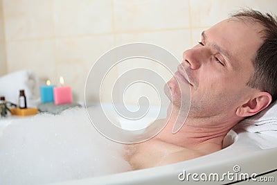 Man having a bath Stock Photo