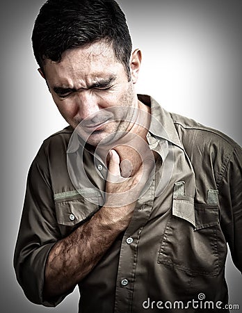 Man having a chest pain or heart attack Stock Photo