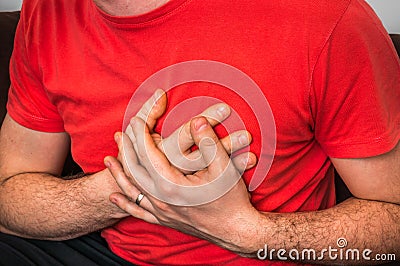 Man having chest pain, heart attack Stock Photo