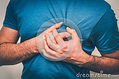 Man having chest pain, heart attack - retro style Stock Photo