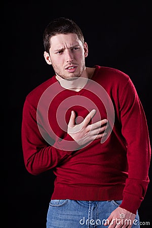 Man having chest pain Stock Photo