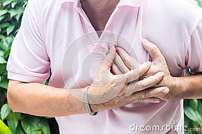 Man having chest pain Stock Photo