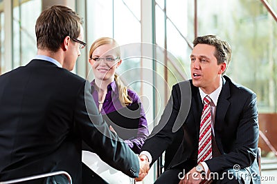 Man having an interview with manager and partner employment job Stock Photo