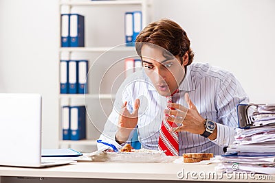 The man having meal at work during break Stock Photo