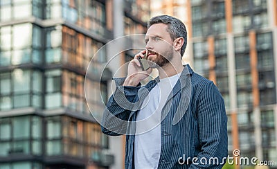man having mobile call in the street, advertisement. man call on mobile outside. Stock Photo