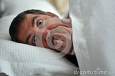 Man having nightmares Stock Photo