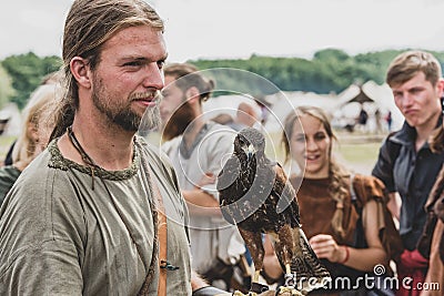 Man with a Hawk at Viking Festival Editorial Stock Photo