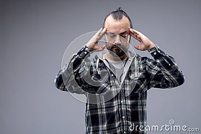 Man with a headache or concentrating Stock Photo