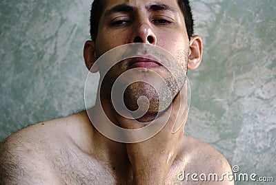 Man with headache and strong sore throat probably has cold Stock Photo