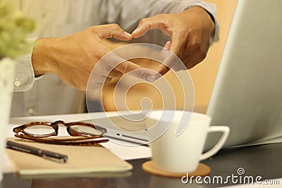 Man and heart symbol from his hand, love work at office Stock Photo