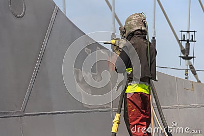 Man with helmet working on a bridge construction Editorial Stock Photo