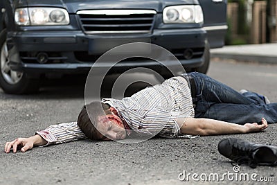 Man hit by a car Stock Photo