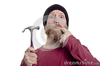 Man hit finger with hammer Stock Photo