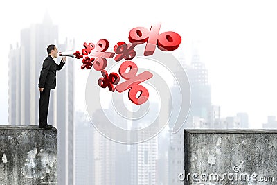 Man hold megaphone with 3D percentage marks spraying out Stock Photo