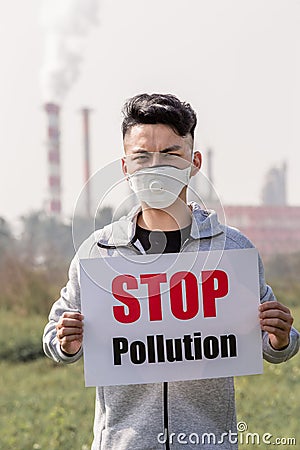 Man hold stop pollution sign Stock Photo