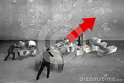 Man holding arrow up sign businessmen pushing currency symbols Stock Photo