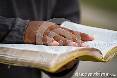 Man holding a Bible Stock Photo