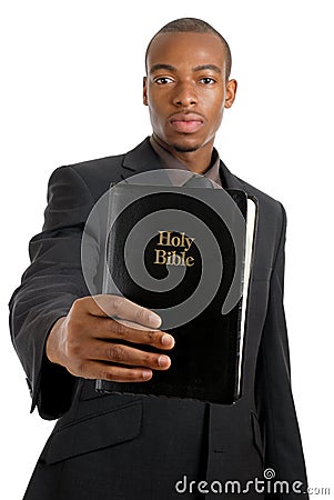 Man holding a bible showing commitment Stock Photo