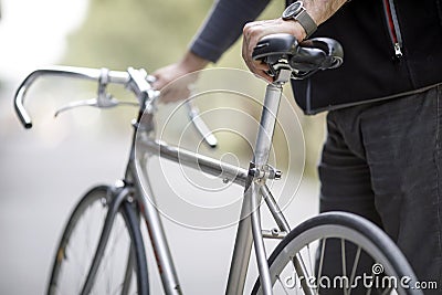 Man holding bike Stock Photo