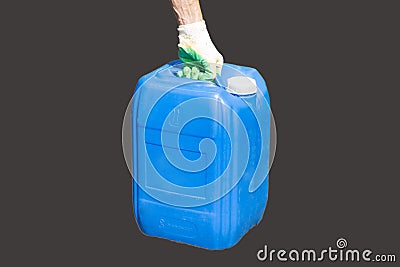 A man holding a blue canister Stock Photo