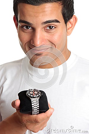 Man holding a chronograph wrist watch Stock Photo