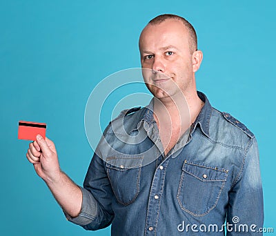 Man holding a credit card in his hand Stock Photo