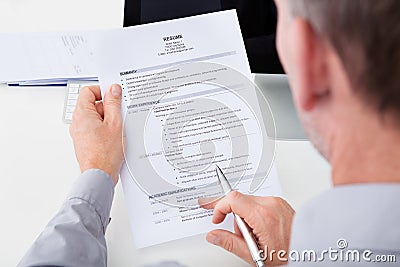 Man holding curriculum vitae Stock Photo