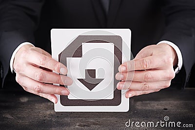 Man holding download icon in hands Stock Photo
