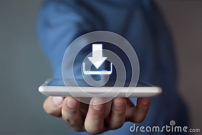 Man holding download icon. Stock Photo