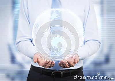 Man holding Earth hologram Stock Photo