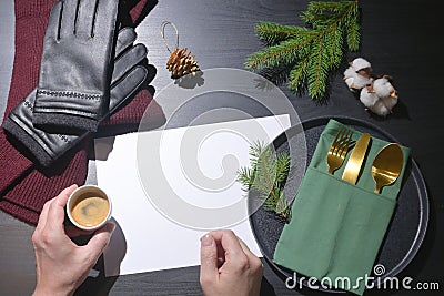 Man Holding Espresso Cup And Winter Accesories Stock Photo