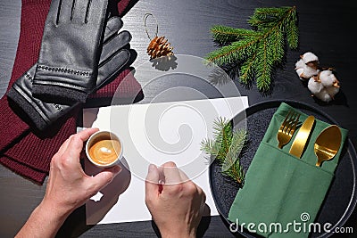 Man Holding Espresso Cup And Winter Accesories Stock Photo