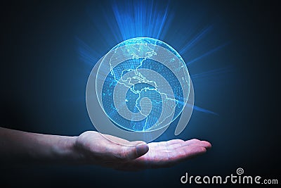 Man is holding glowing globe in hand. Global network concept. Stock Photo