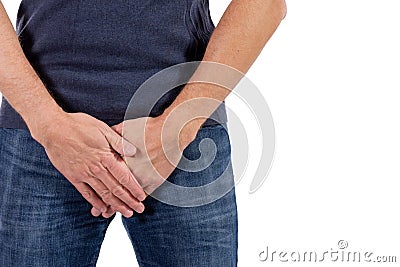 Man holding his urethra in pain. Men problems on white background. Medical concept Stock Photo
