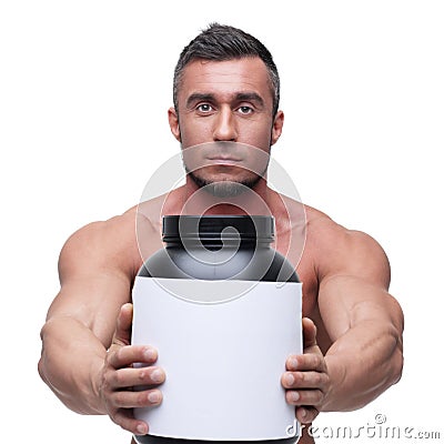 Man holding holding jar with protein Stock Photo
