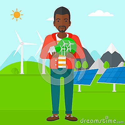 Man holding lightbulb with windmills inside. Vector Illustration