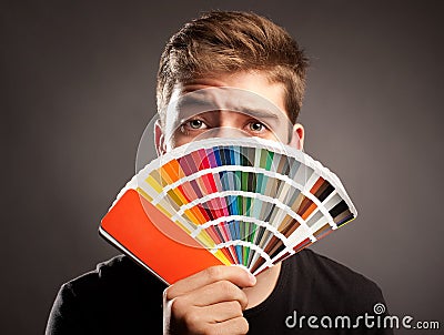 Man holding a pantone Stock Photo