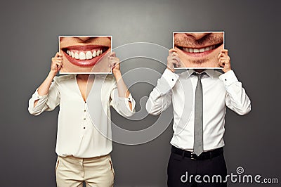 Man holding pictures with big smile Stock Photo