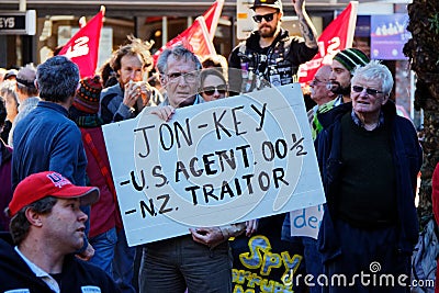Man holding a placard protesting against the New Zealand government`s Government Communications Security Bureau GCSB bill Editorial Stock Photo