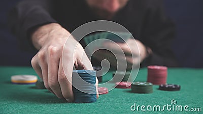 Man holding poker chips. Casino Stock Photo